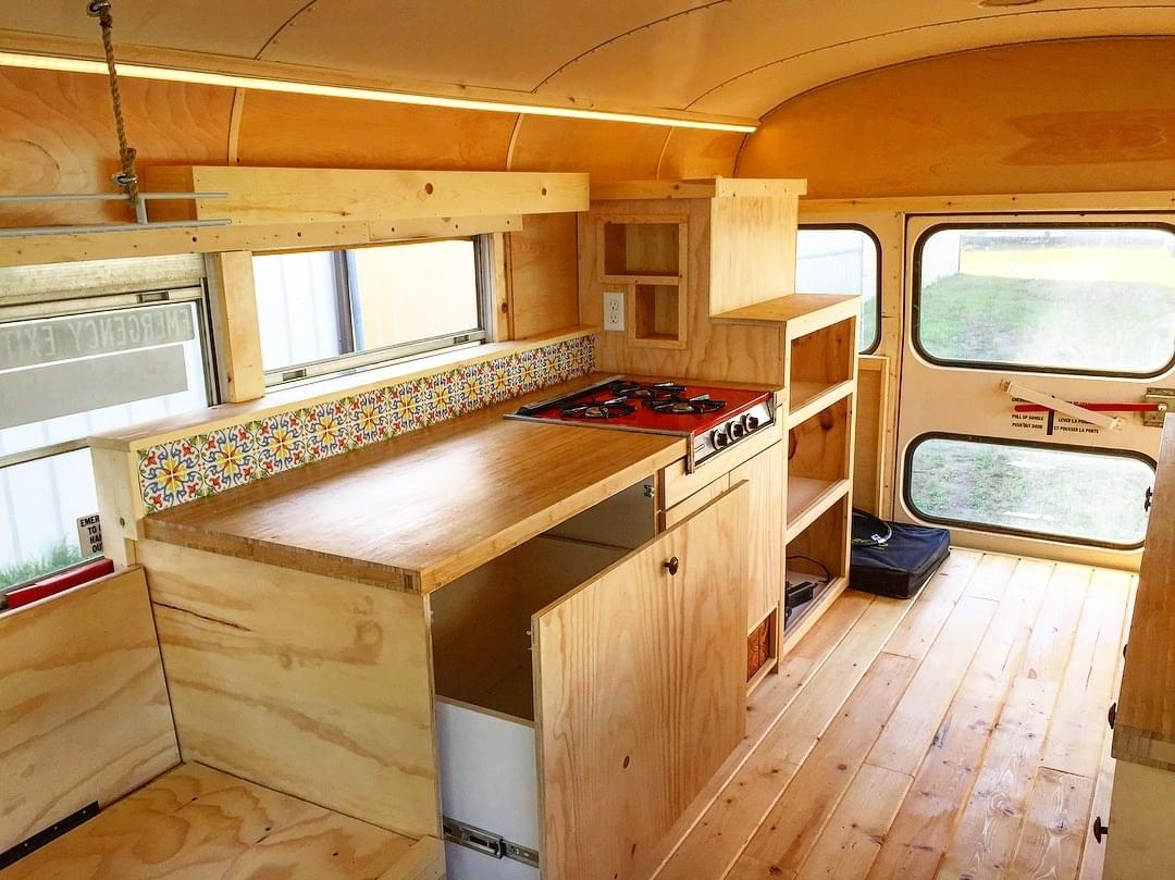 natural wood short school bus conversion