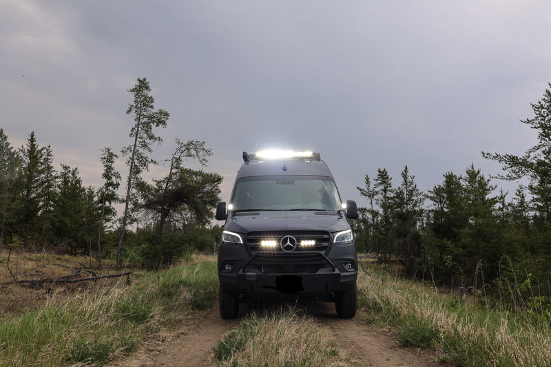 Black Mercedes-Benz Sprinter 144 camper van outdoors