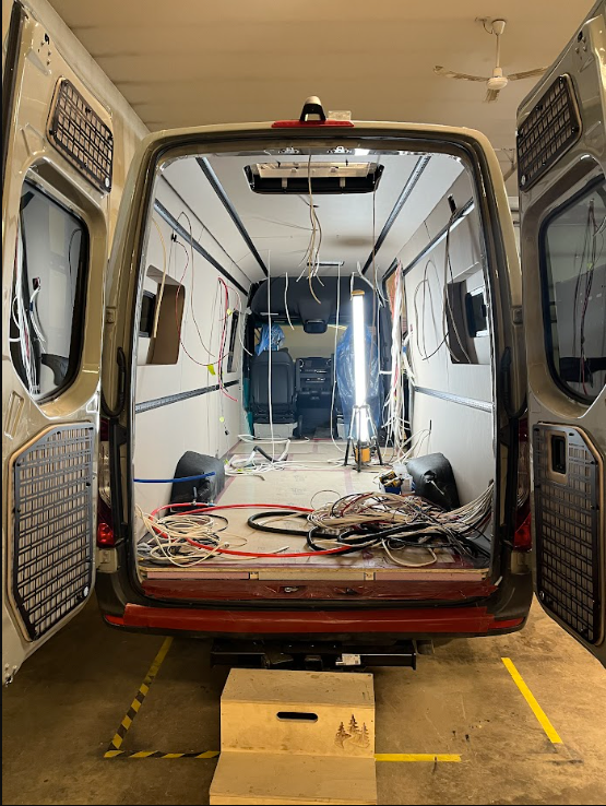 Custom camper van conversion in progress on the 2Pines shop floor in Prince Albert