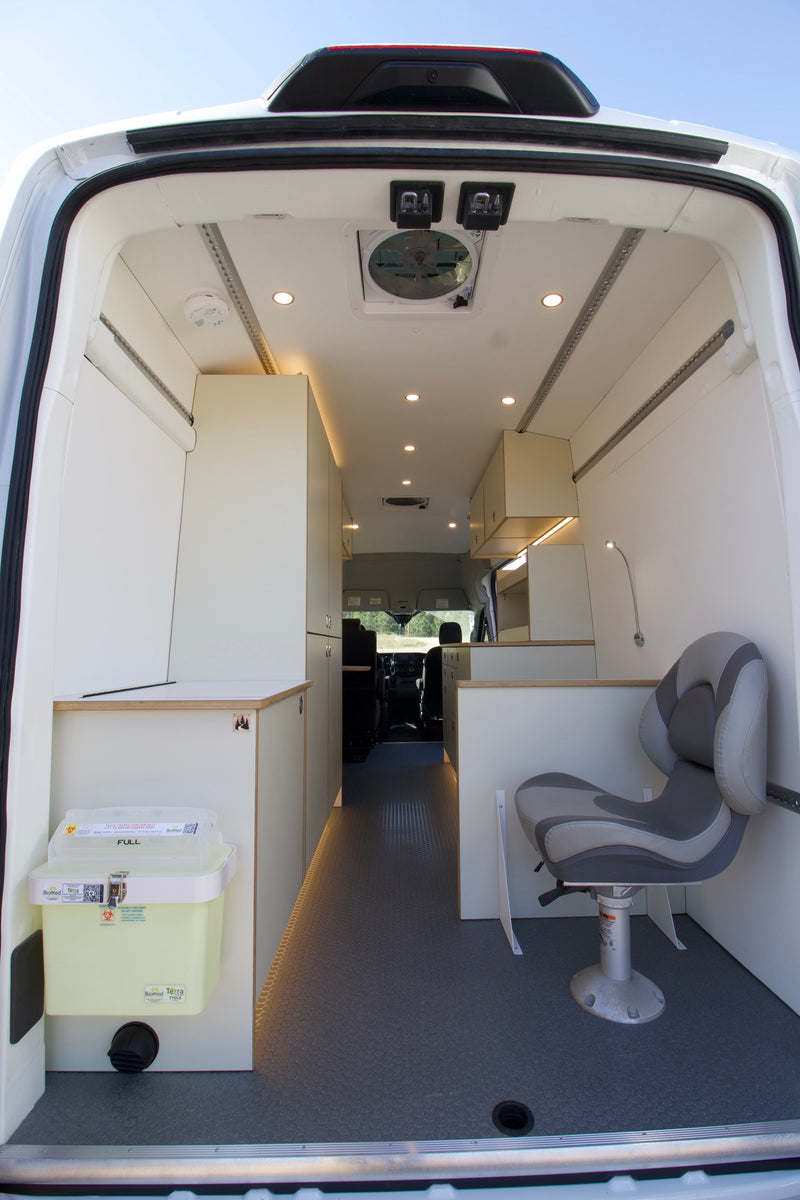 SHA mobile outreach clinic interior with exam seating