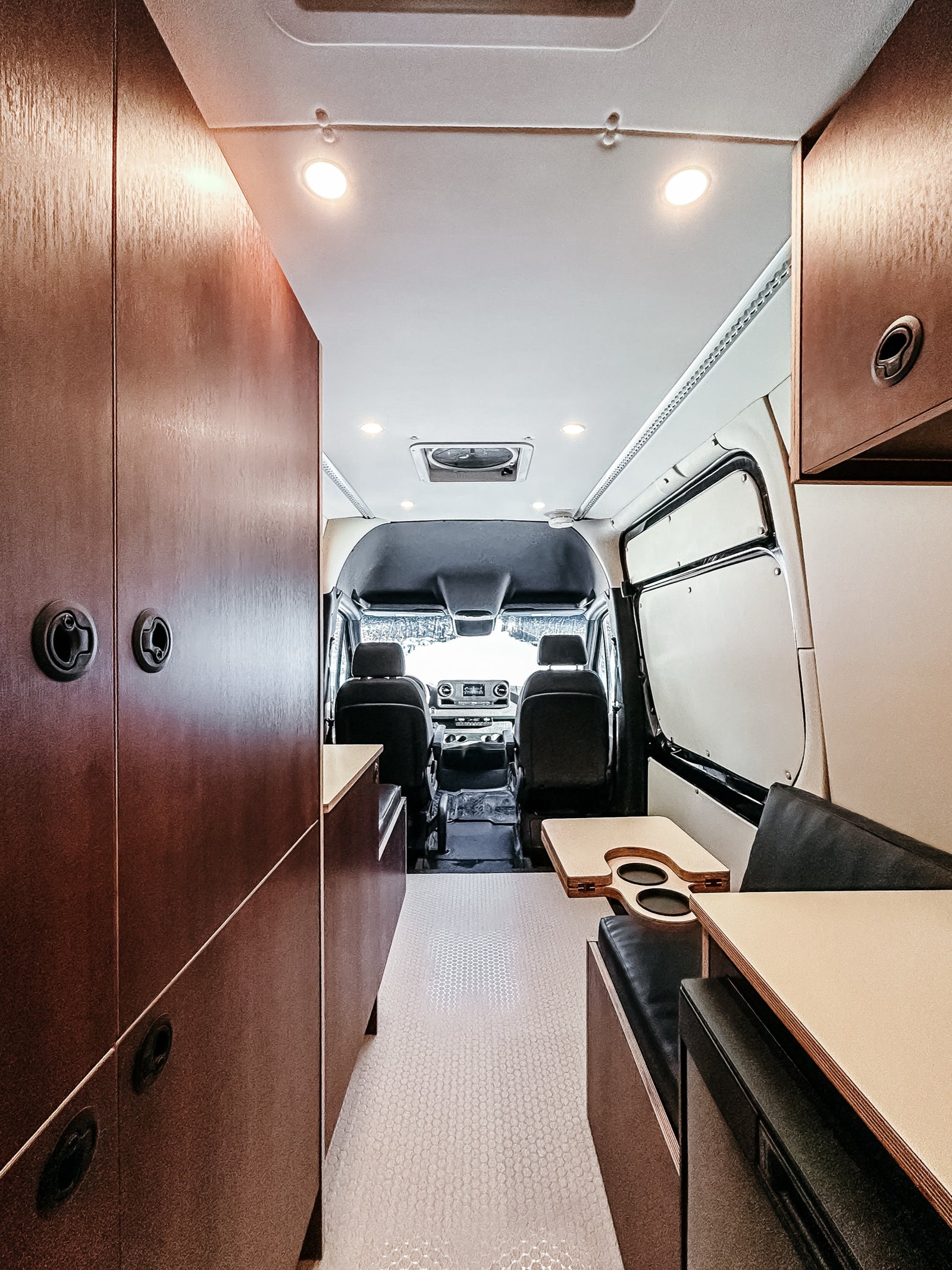Sunshine Clinic Sprinter 144 camper van conversion by 2Pines Upfitters, photo 1